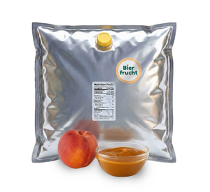 Peach aseptic fruit puree in 44 lb packaging for breweries, hard seltzers, beverages, ice cream, sauces, desserts, and food manufacturing applications