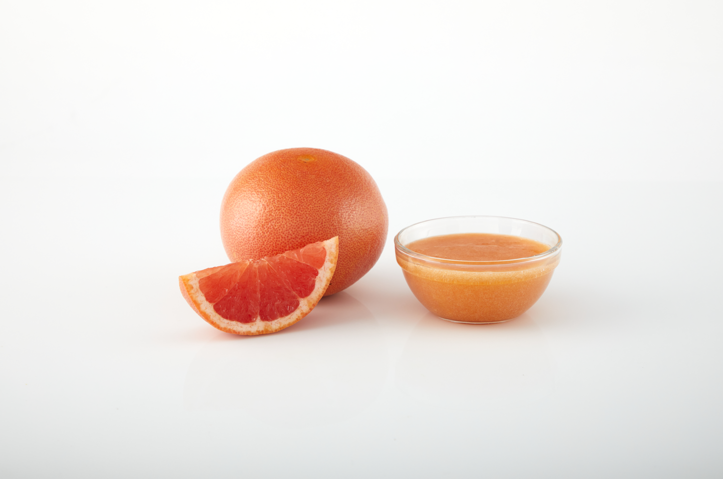 Graprefruit aseptic fruit puree in 44 lb packaging for breweries, hard seltzers, beverages, ice cream, sauces, desserts, and food manufacturing applications