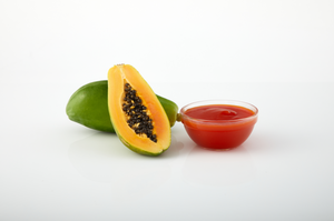 Papaya aseptic fruit puree in 44 lb packaging for breweries, hard seltzers, beverages, ice cream, sauces, desserts, and food manufacturing applications