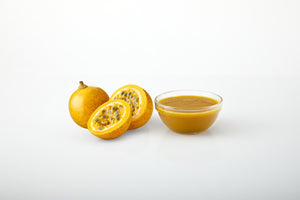 Passion fruit aseptic fruit puree in 11 lb packaging for breweries, hard seltzers, beverages, ice cream, sauces, desserts, and food manufacturing applications
