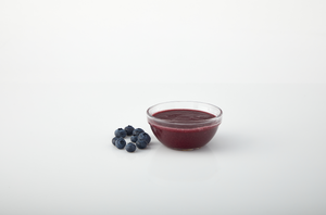 Blueberry aseptic fruit puree in packaging for breweries, hard seltzers, beverages, ice cream, sauces, desserts, and food manufacturing applications