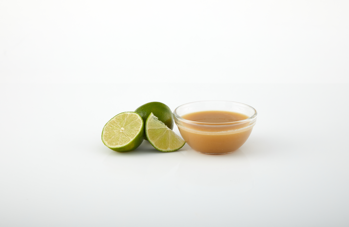 Lime aseptic fruit puree in packaging for breweries, hard seltzers, beverages, ice cream, sauces, desserts, and food manufacturing applications