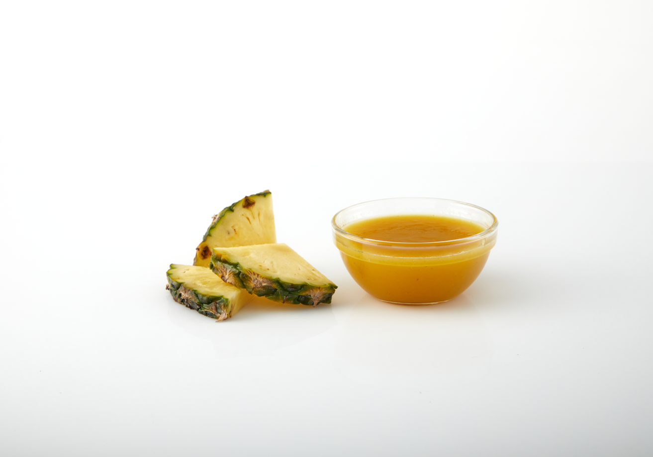 Pineapple aseptic fruit puree in packaging for breweries, hard seltzers, beverages, ice cream, sauces, desserts, and food manufacturing applications