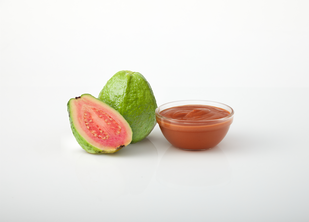Pink Guava aseptic fruit puree in 40 lb packaging for breweries, hard seltzers, beverages, ice cream, sauces, desserts, and food manufacturing applications